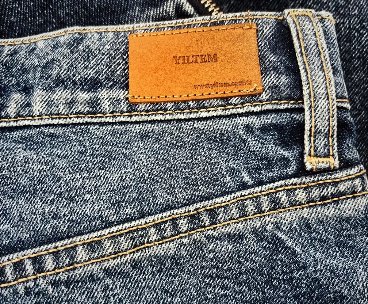 Denim back pocket with a Yıltem leather patch